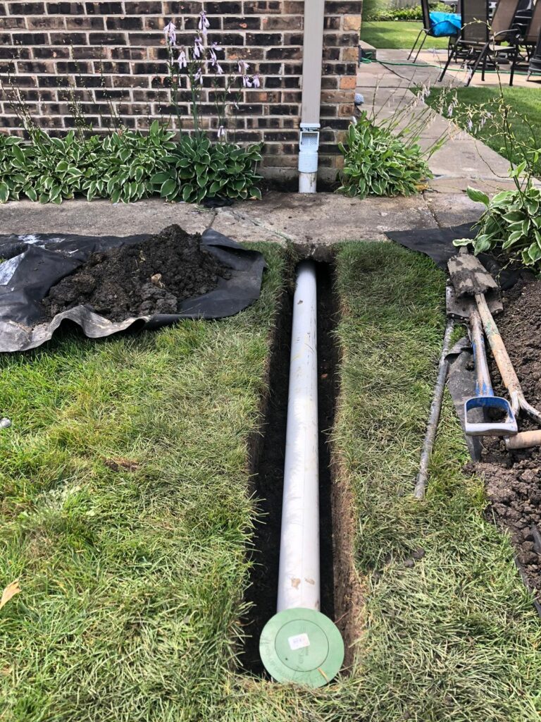 Champaign Underground Gutter Drain / Buried Downspouts